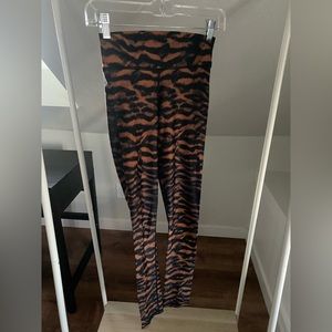 The Upside Tiger Stripe pattern workout leggings